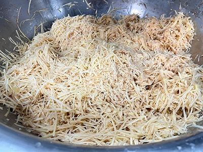 Máquina para cortar y rallar verduras